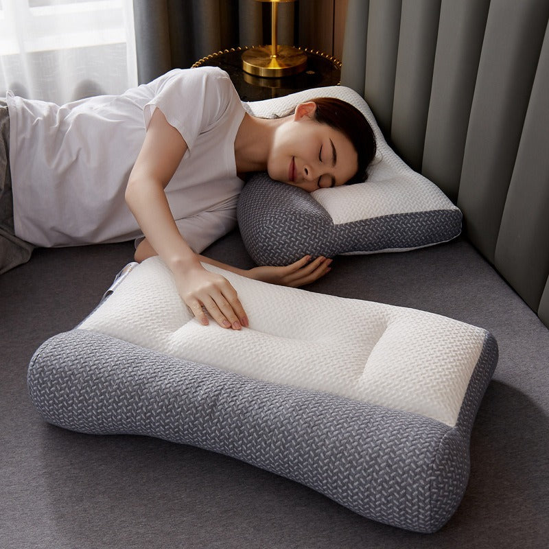 Comfortable ergonomic pillow in grey and white, ideal for neck support and restful sleep.
